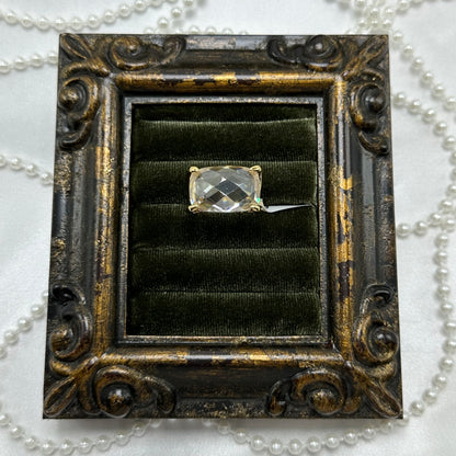 14k gold electroplated vintage deadstock ring with large clear stone and cubic zirconia stones on the side.