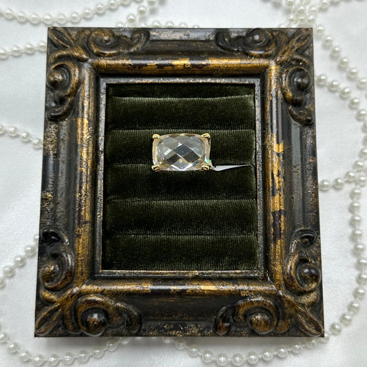 14k gold electroplated vintage deadstock ring with large clear stone and cubic zirconia stones on the side.