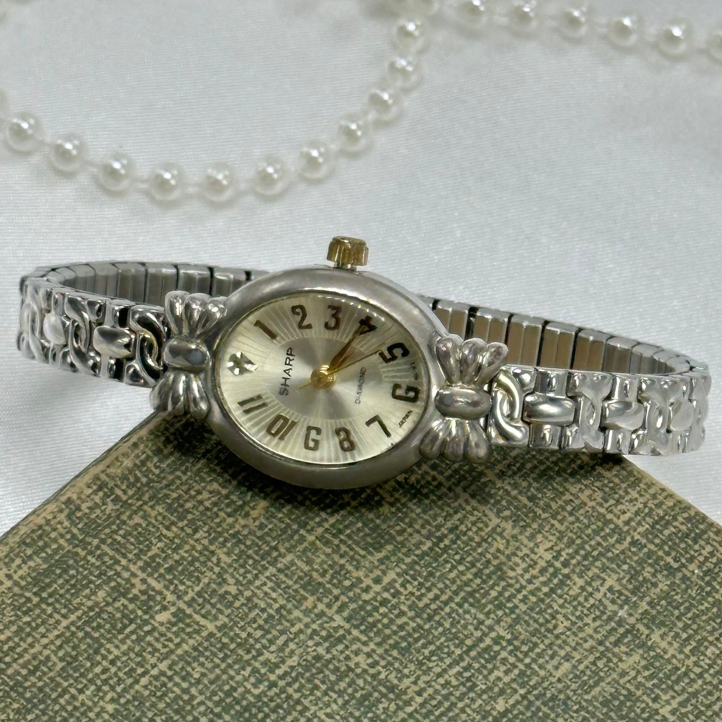 Two-Tone Oval Dial Watch with Bows