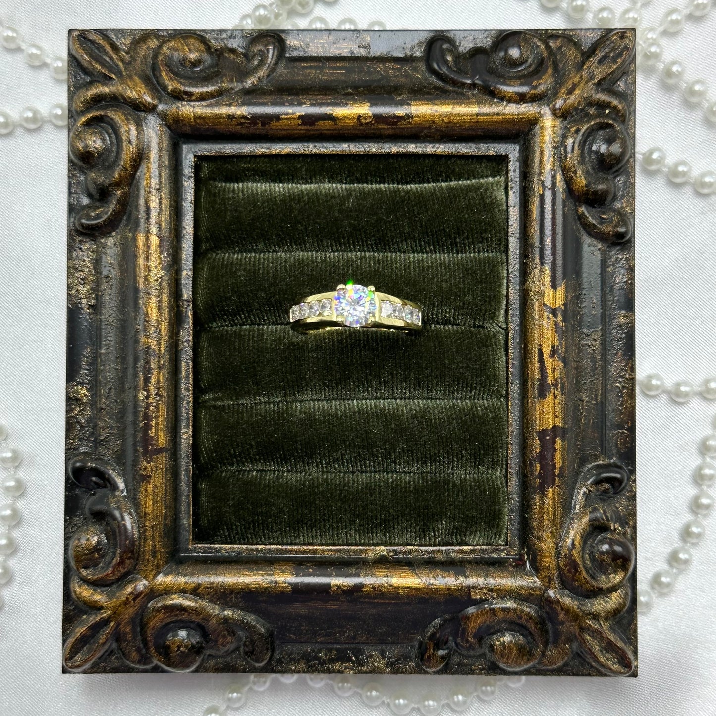 14k gold electroplated vintage deadstock ring with round clear cubic zirconia stone.