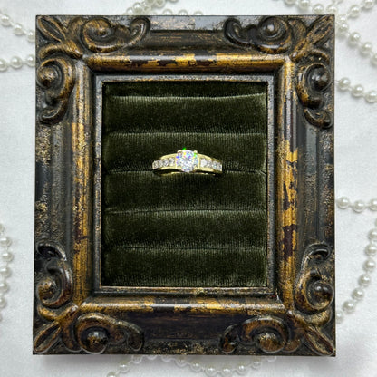 14k gold electroplated vintage deadstock ring with round clear cubic zirconia stone.