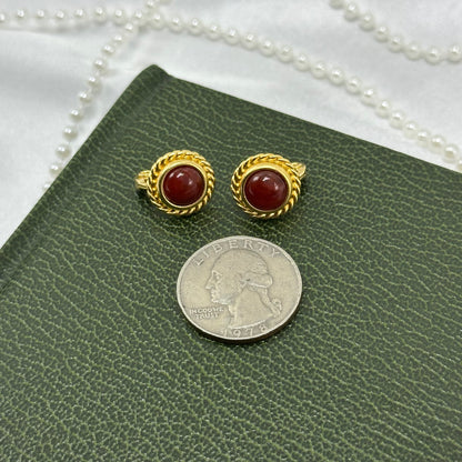 Gold Tone Oval Clip On Earrings with Red Stones