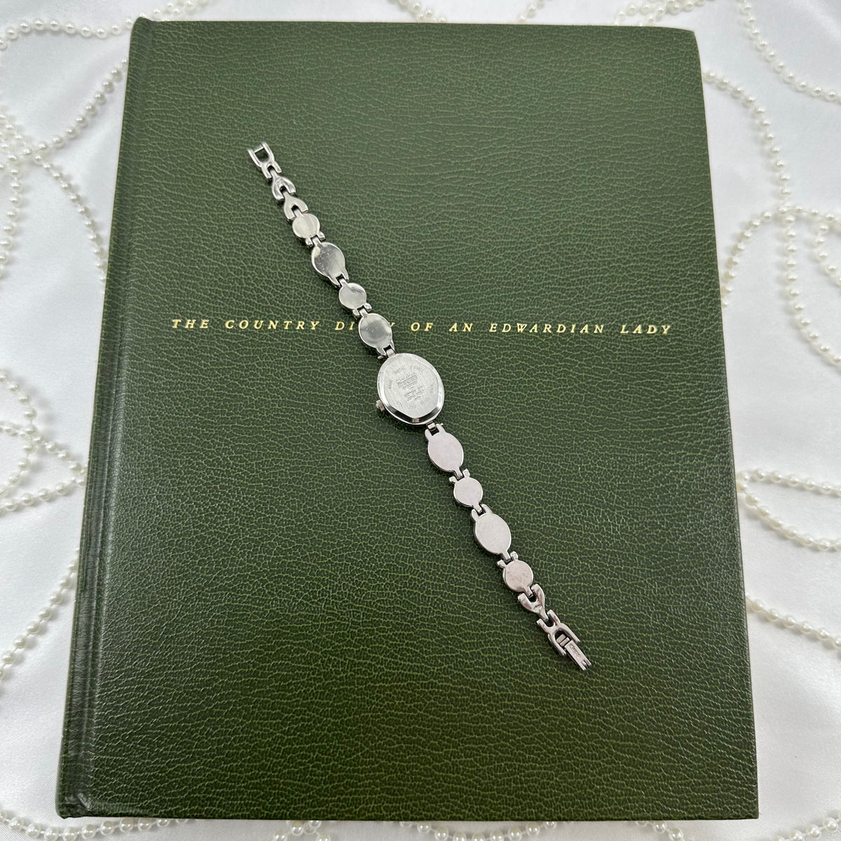 Silver Cameo Watch with Mother of Pearl Dial