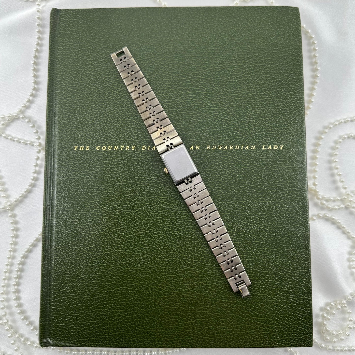 Rare Two-Tone Vintage Geneva Tank Watch with Vine Details