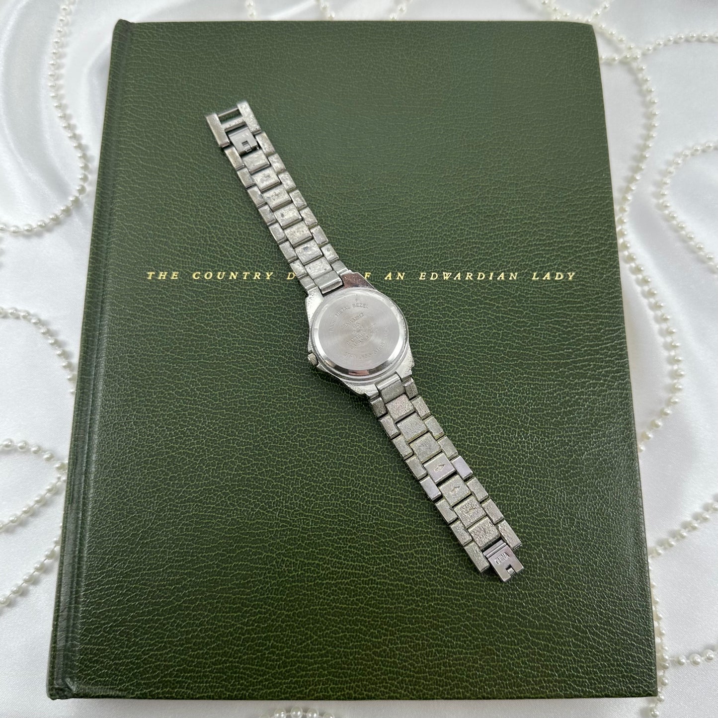 Silver Round Champagne Dial Watch