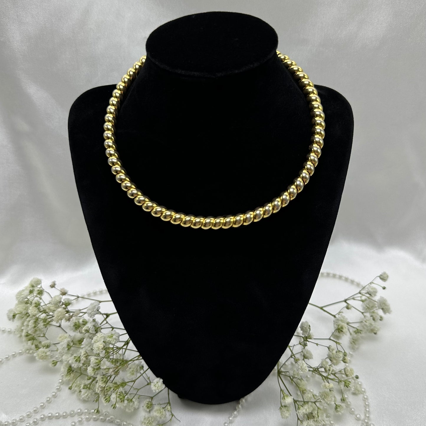 Vintage gold tone coil wrap choker necklace with twisted wrapped metal.