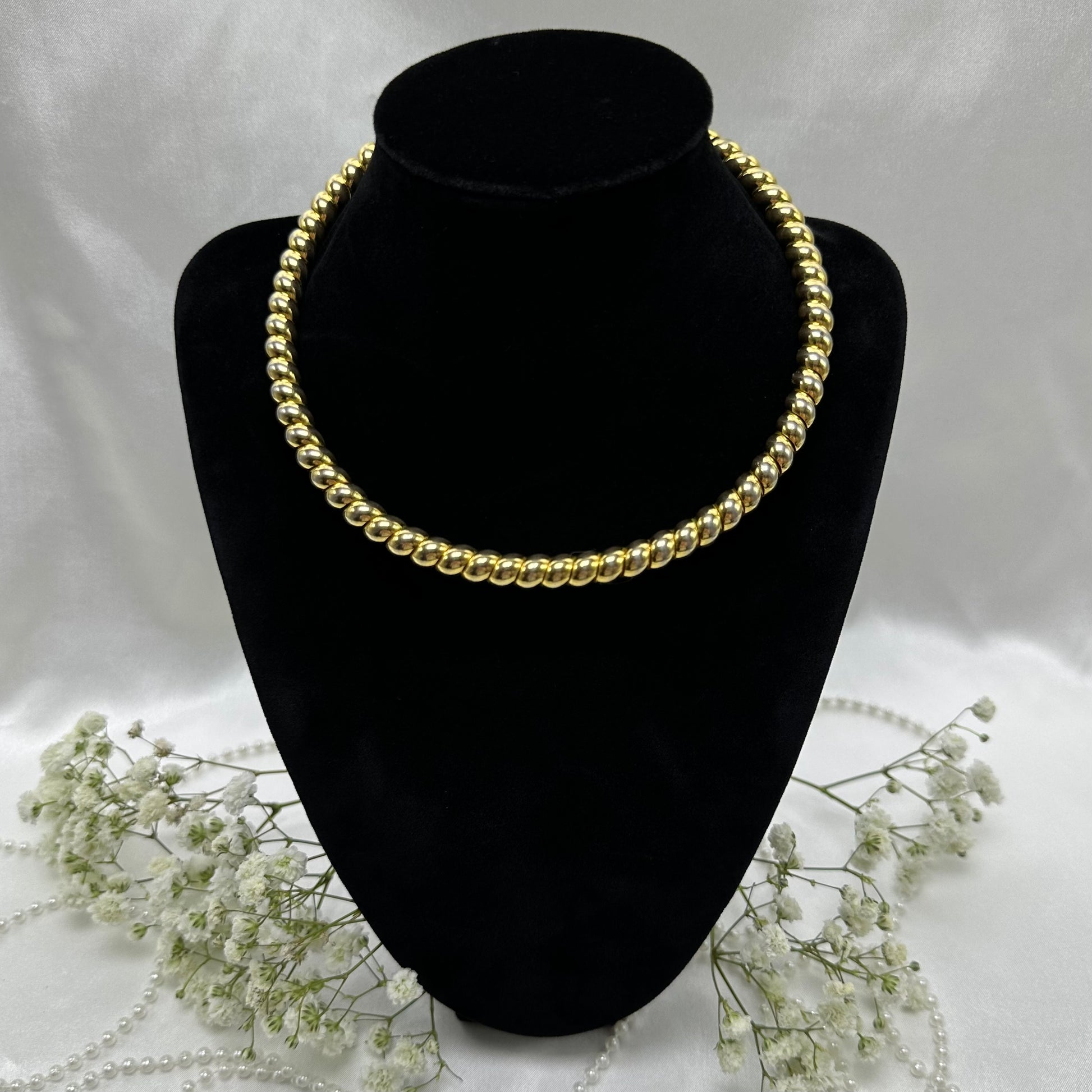 Vintage gold tone coil wrap choker necklace with twisted wrapped metal.