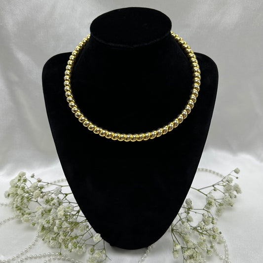 Vintage gold tone coil wrap choker necklace with twisted wrapped metal.