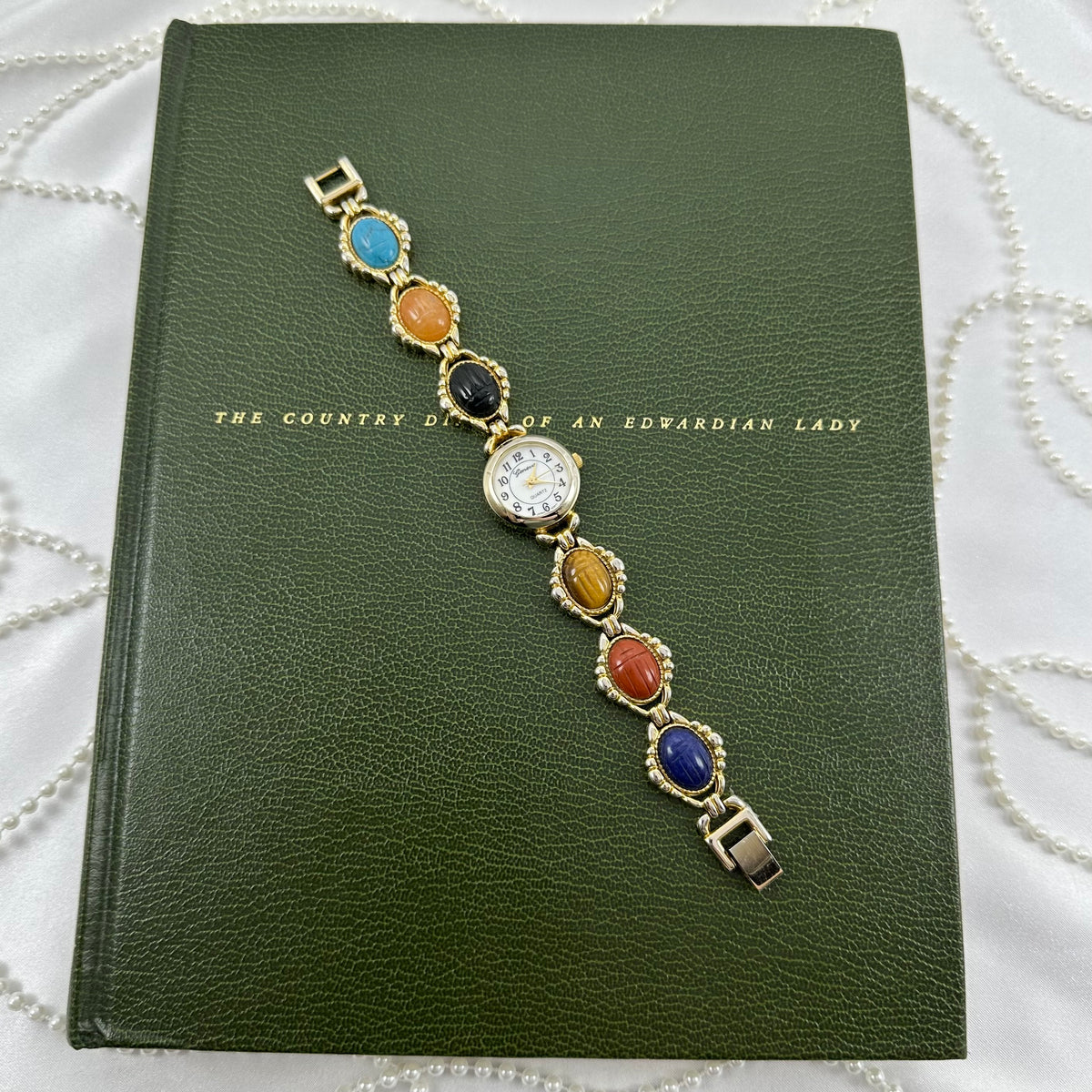 Vintage Gold Scarab Watch with Mother of Pearl Dial
