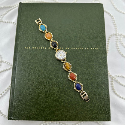 Vintage Gold Scarab Watch with Mother of Pearl Dial