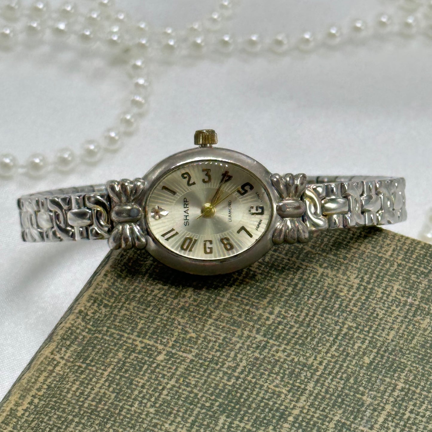 Two-Tone Oval Dial Watch with Bows