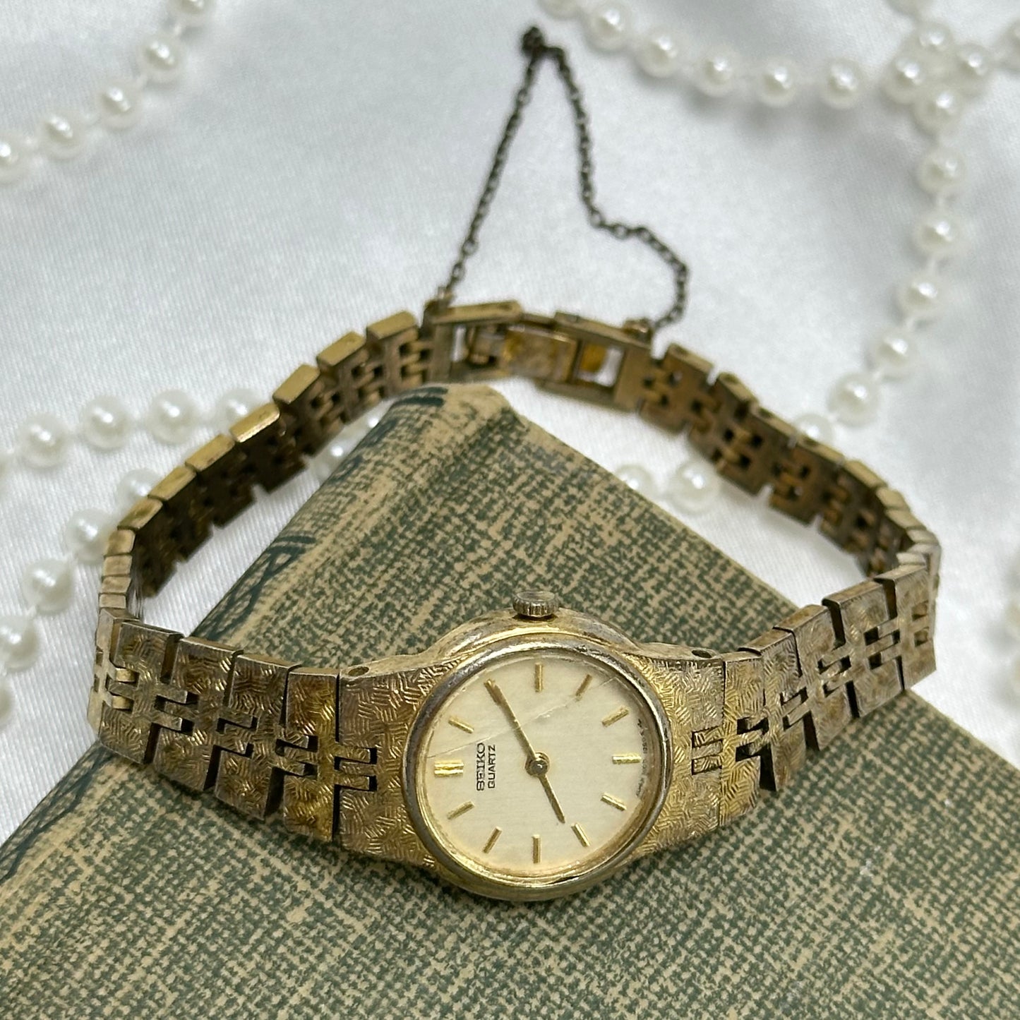 Dainty Gold Round Dial Seiko Watch