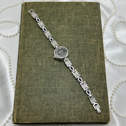 Silver Round Dial Watch with Blue Gemstone Band