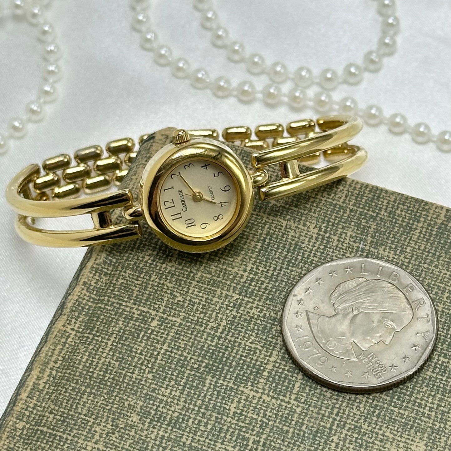 Gold Carriage Cuff Watch