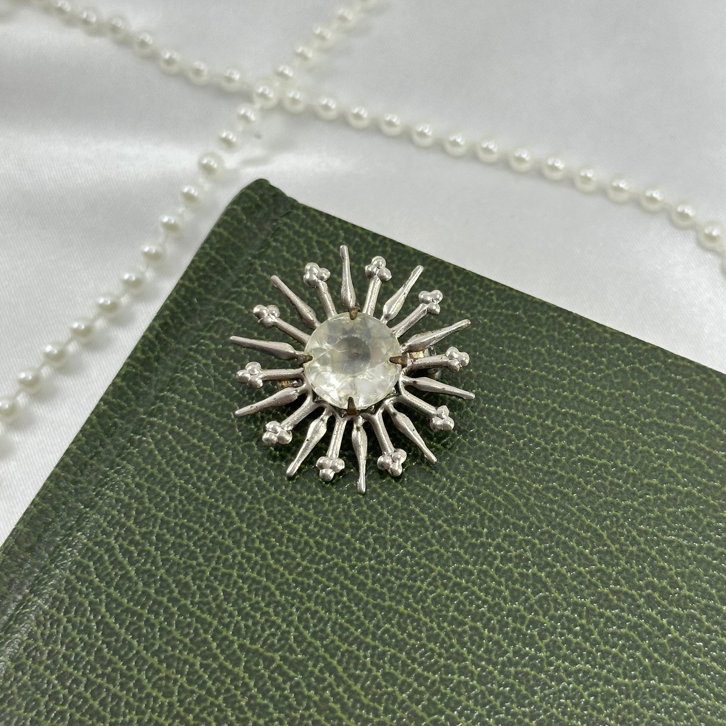 Vintage Silver Starburst Pin