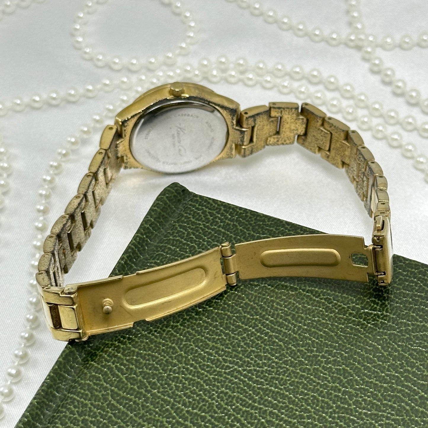Gold Kenneth Cole Vintage Tank Watch with Mother of Pearl Dial
