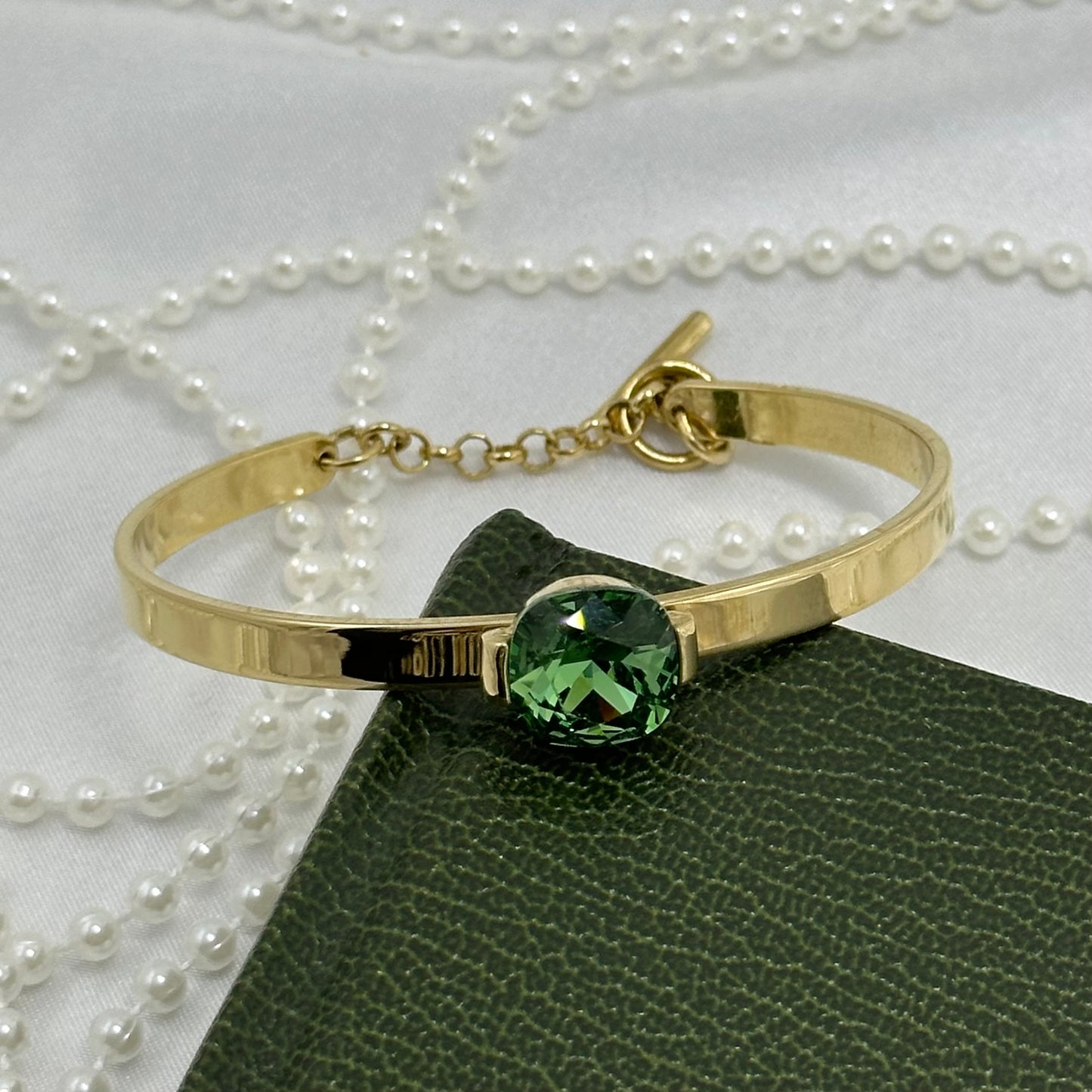 Gold Bangel with Green Stone