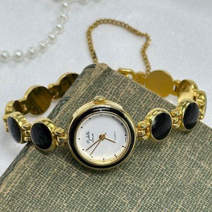 Elegant Round Dial Gold and Black Watch