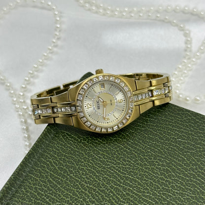 Queen's Court Gold Relic Watch with Crystal Accents and Date Display