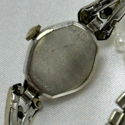 Dainty 10k RGP Silver Bulova Wind-Up Watch with Elegant Band