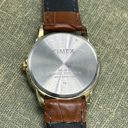 Gold and Brown Timex Indiglo Watch