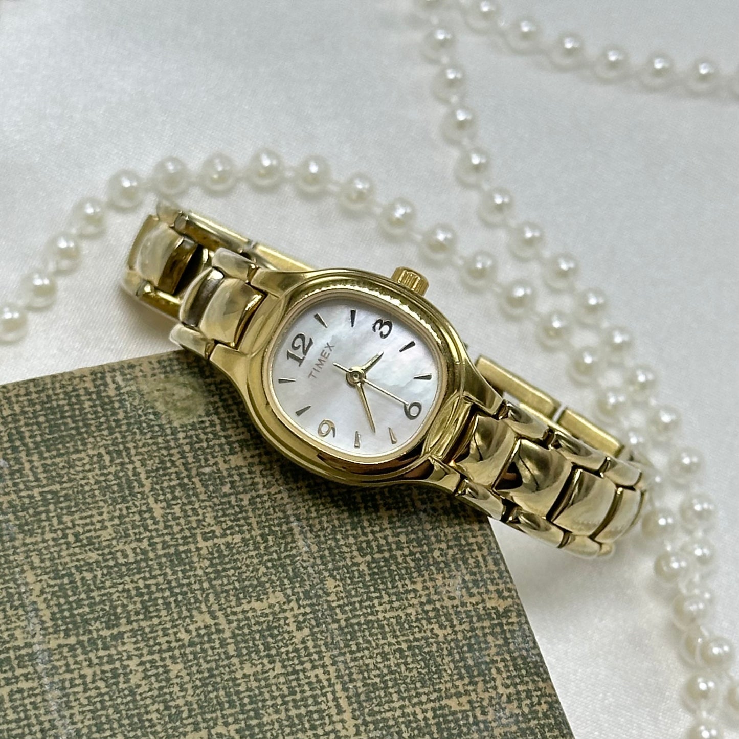 Gold Timex Watch with Mother of Pearl Dial