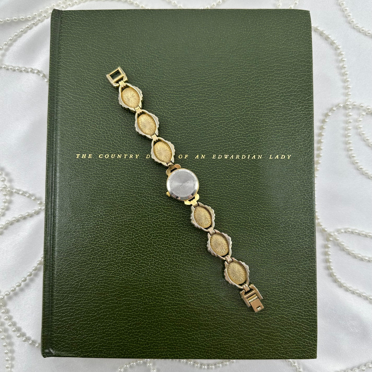 Vintage Gold Scarab Watch with Mother of Pearl Dial