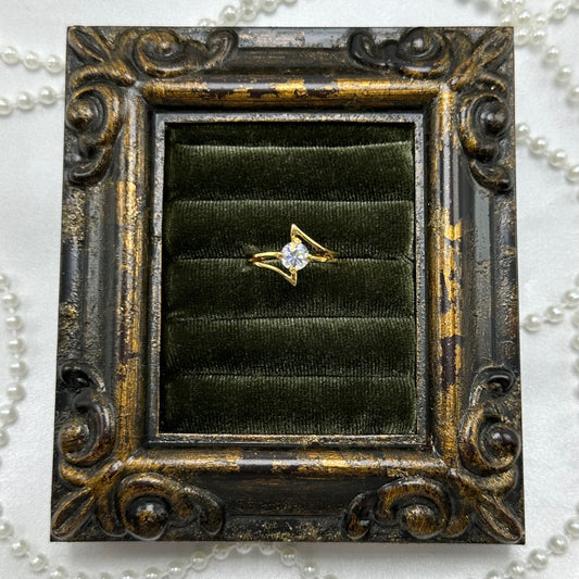 14k gold electroplated vintage deadstock ring with solitaire round clear cubic zirconia stone.