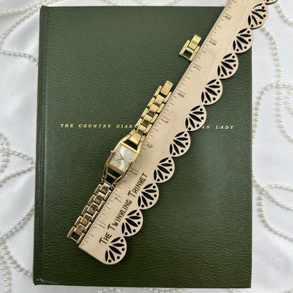 Classic Gold Nine & Company Watch with Rectangular Dial