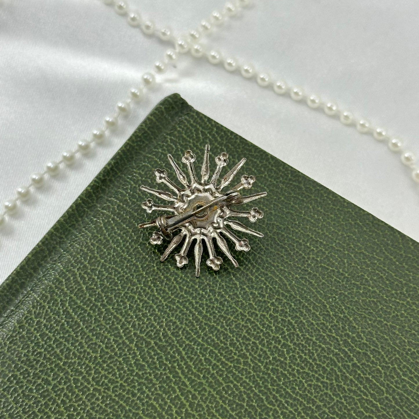 Vintage Silver Starburst Pin