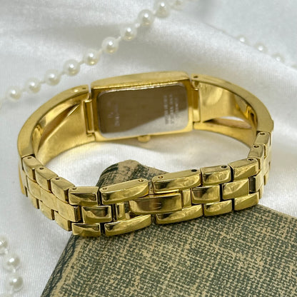 Gold Bulova Watch with Swarovski Crystals and Roman Numeral Markers