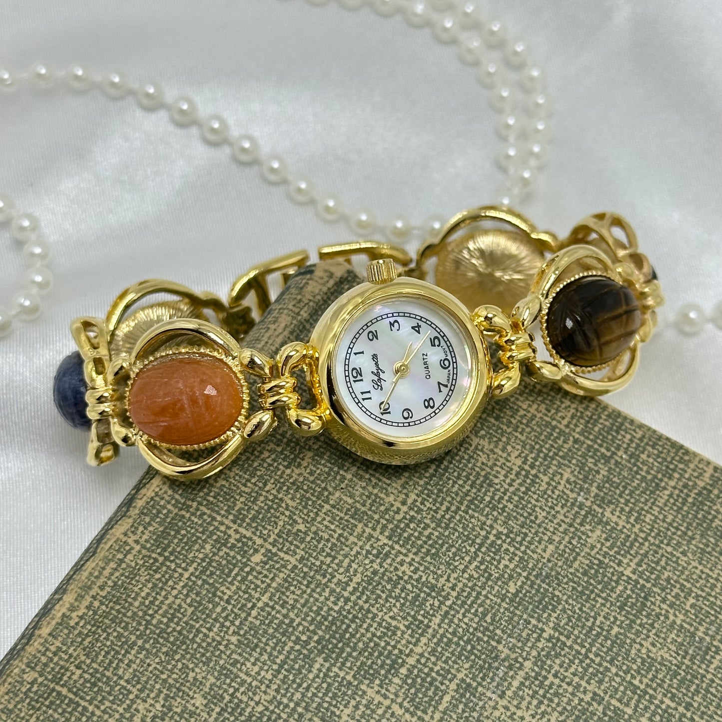 Vintage Gold Scarab Watch with Mother of Pearl Dial