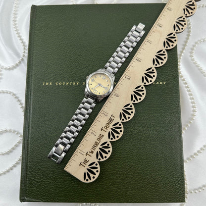 Silver Round Champagne Dial Watch