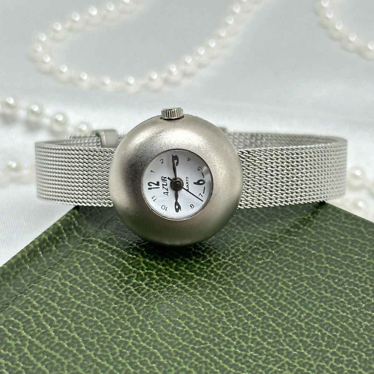 Dainty Silver Watch with Bubble Dial and Mesh Band