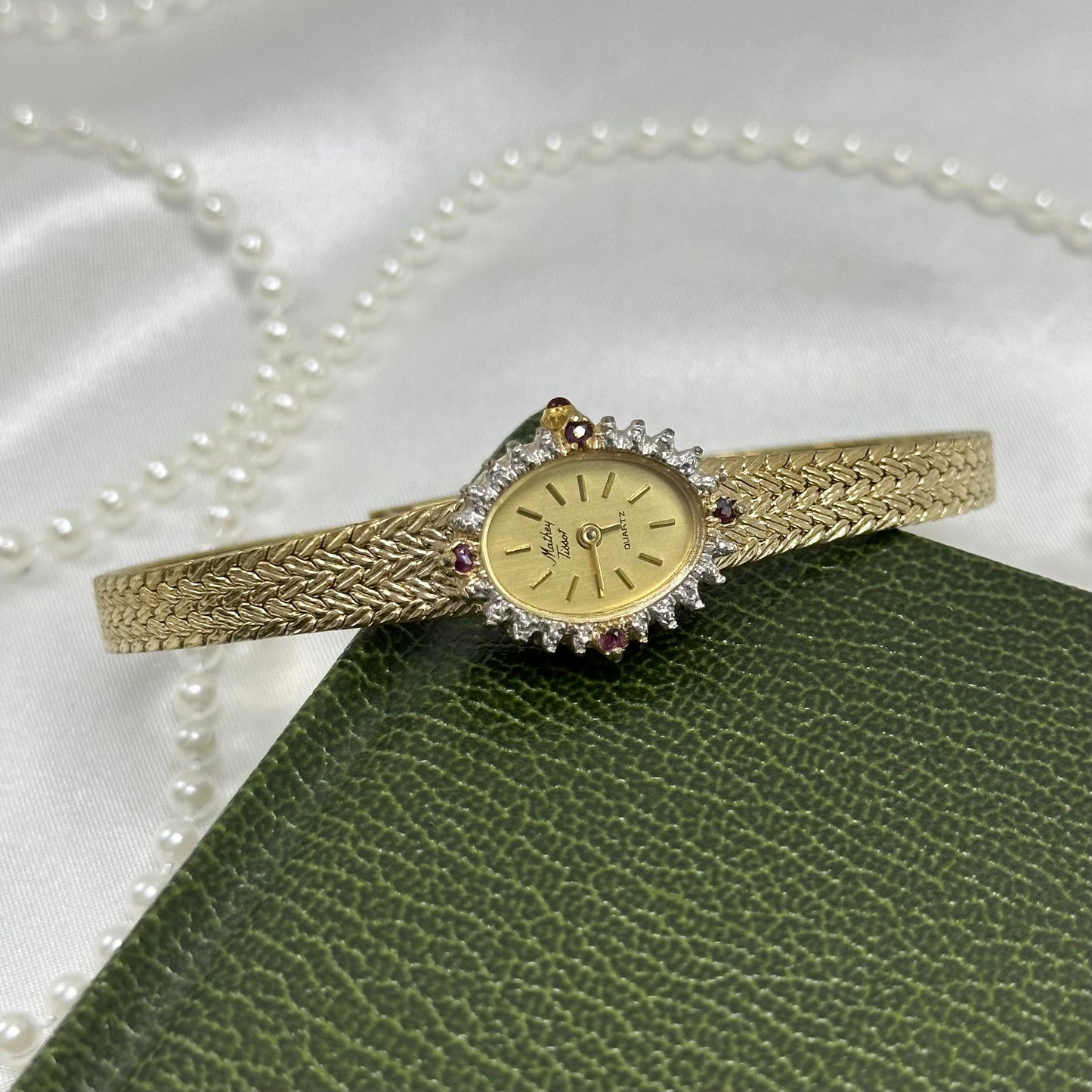 Elegant Gold Mathey Tissot Watch with Rubies and Diamonds