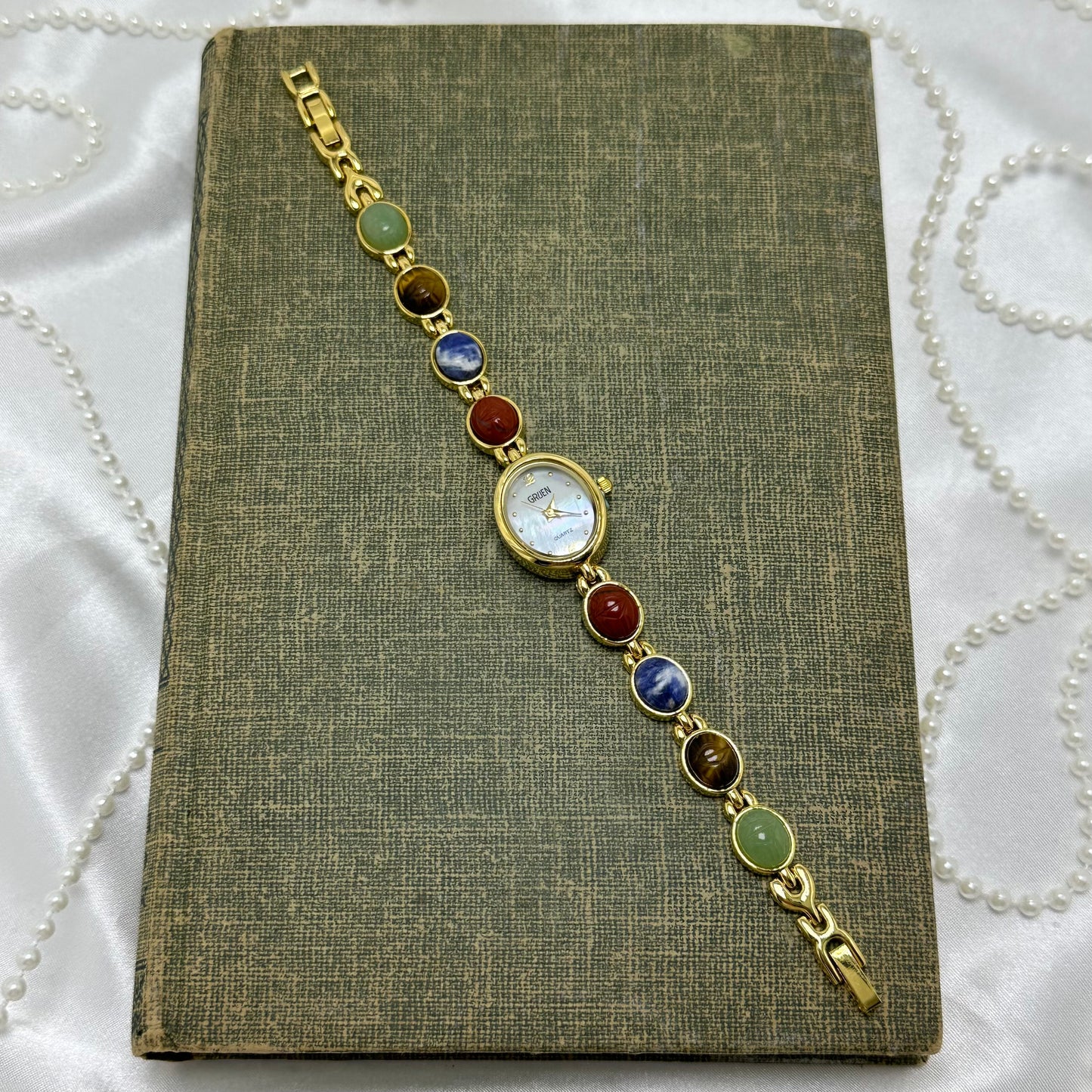 Gold Gruen Scarab Watch with Mother of Pearl Dial