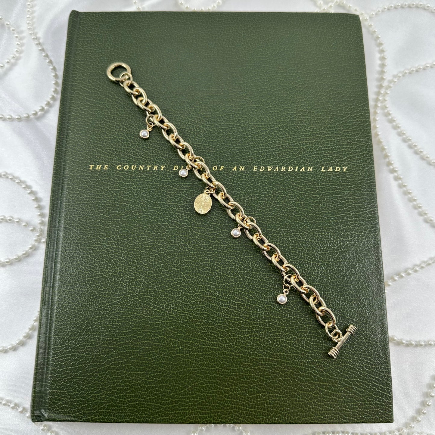 Gold Pearls and Black Cameo Charm Bracelet