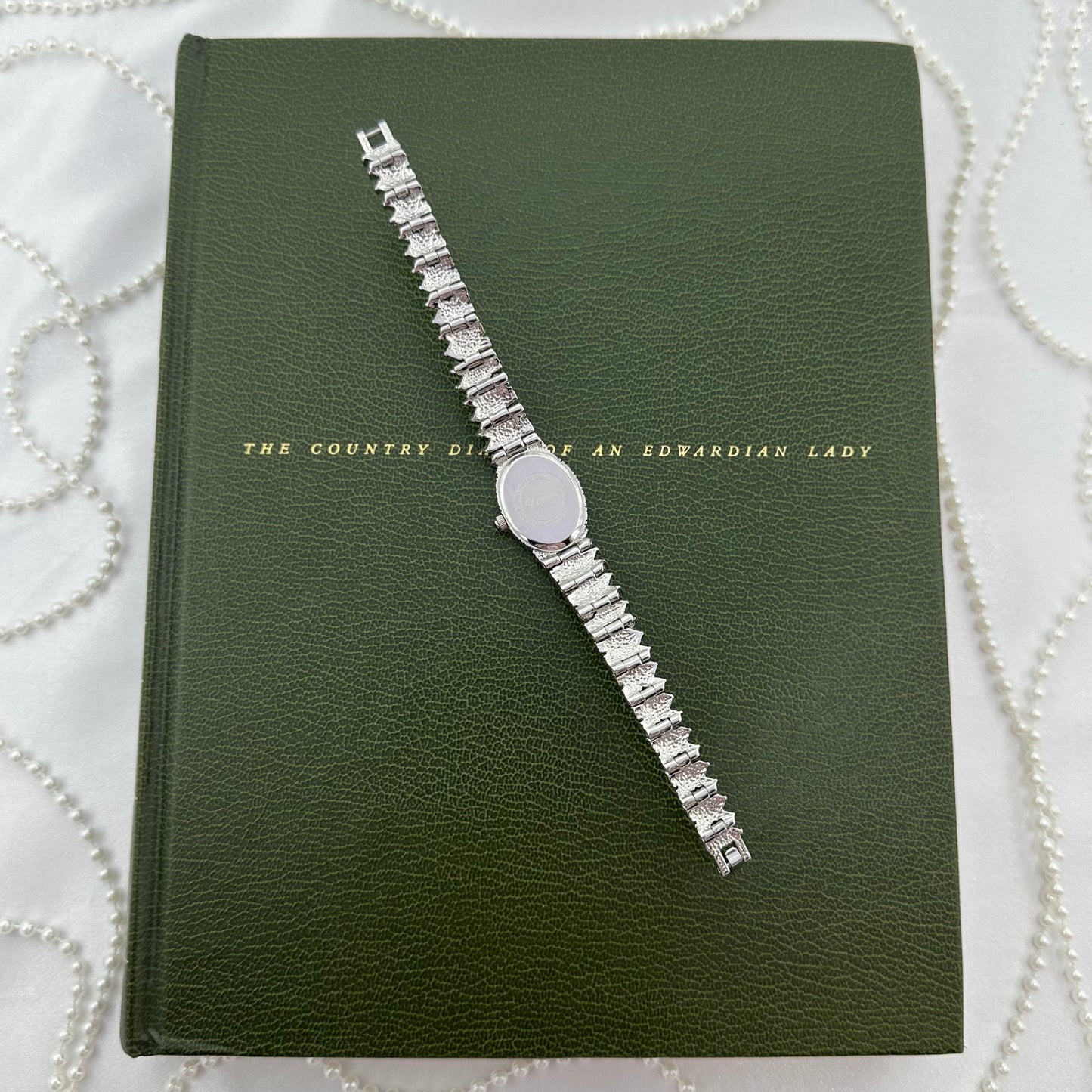 Elegant Crystal Silver Watch with Mother of Pearl Dial