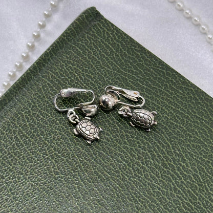 Silver Dangle Clip on Earrings with Turtles