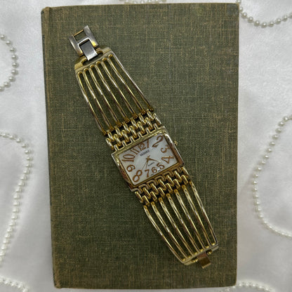 Chunky Gold Cuff Watch with Mother of Pearl Dial