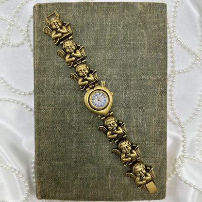 Rare Gold Slide Charm Cherub Watch with Mother of Pearl Heart Dial