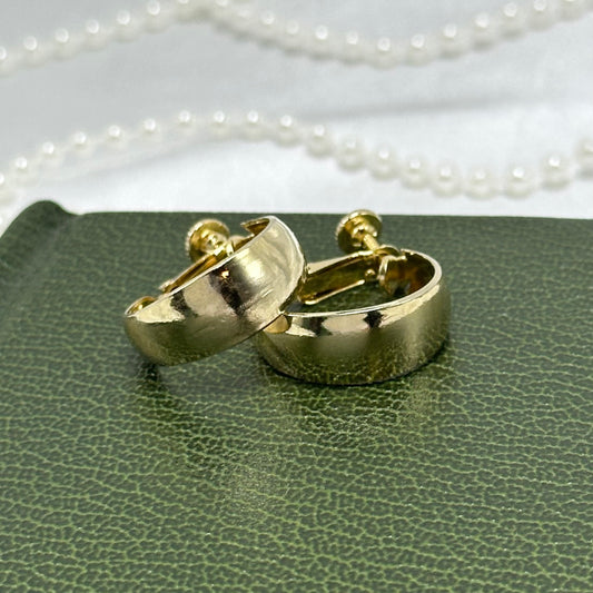 Classic vintage gold tone clip on screw back hoop earrings.