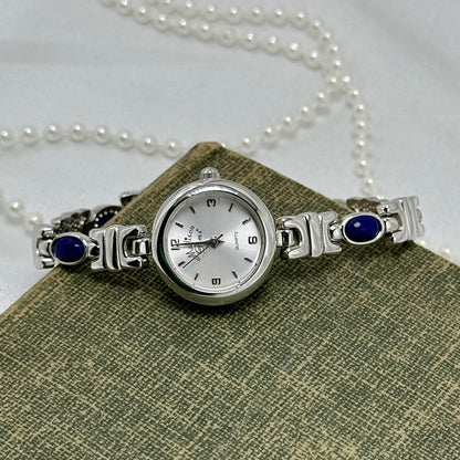 Silver Round Dial Watch with Blue Gemstone Band