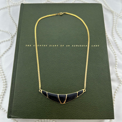 Vintage gold tone and black enamel choker necklace.