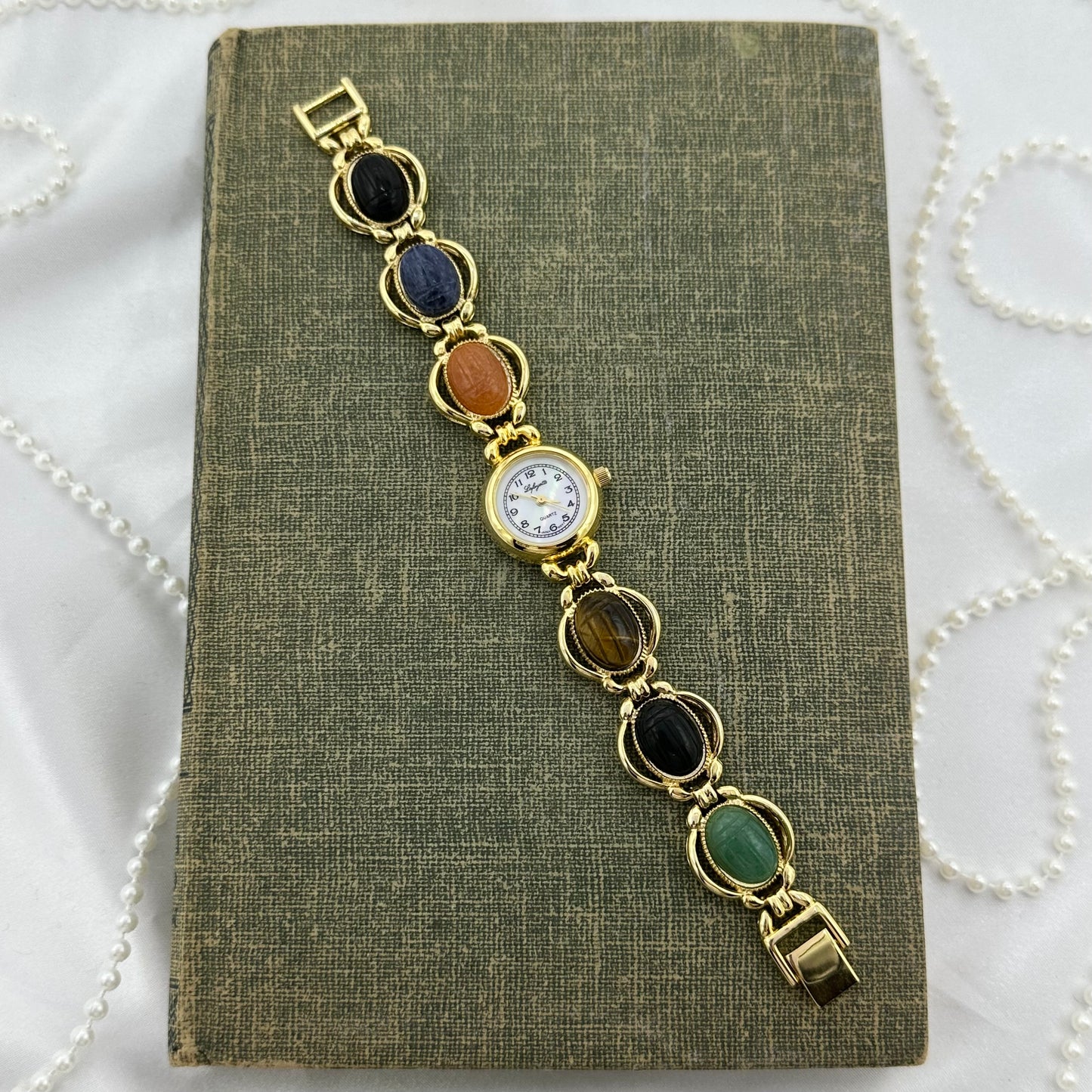 Vintage Gold Scarab Watch with Mother of Pearl Dial