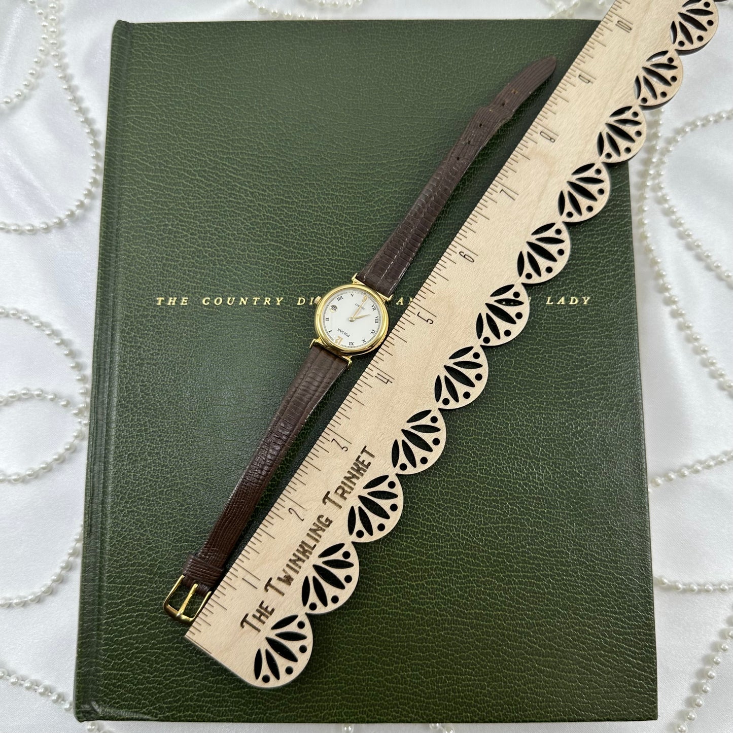 Vintage Gold Pulsar Watch with Brown Leather Band and Date Display