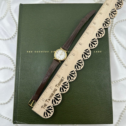 Vintage Gold Pulsar Watch with Brown Leather Band and Date Display