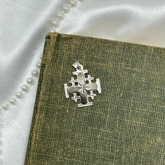 925 sterling silver Jerusalem pendant. Diamond cut front. Unique back design.
