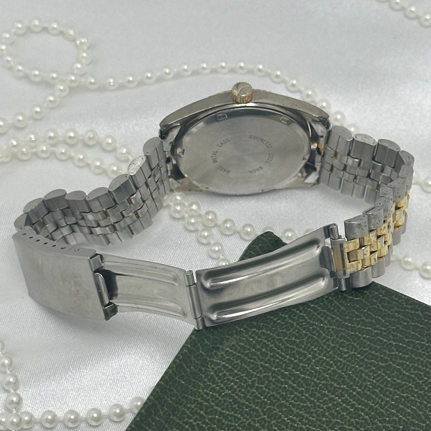 Two-Tone Geneva Tank Watch with Black Dial and Date Display