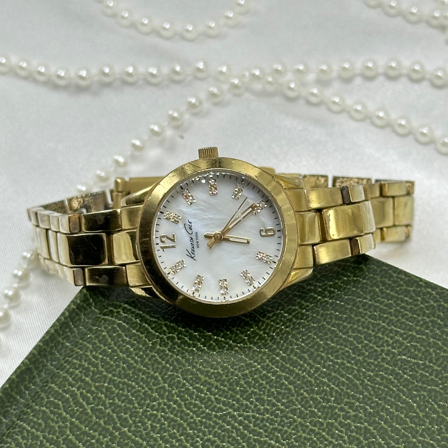 Gold Kenneth Cole Vintage Tank Watch with Mother of Pearl Dial